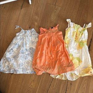 Set of Three Girls' Dresses in Floral and Solid Designs
